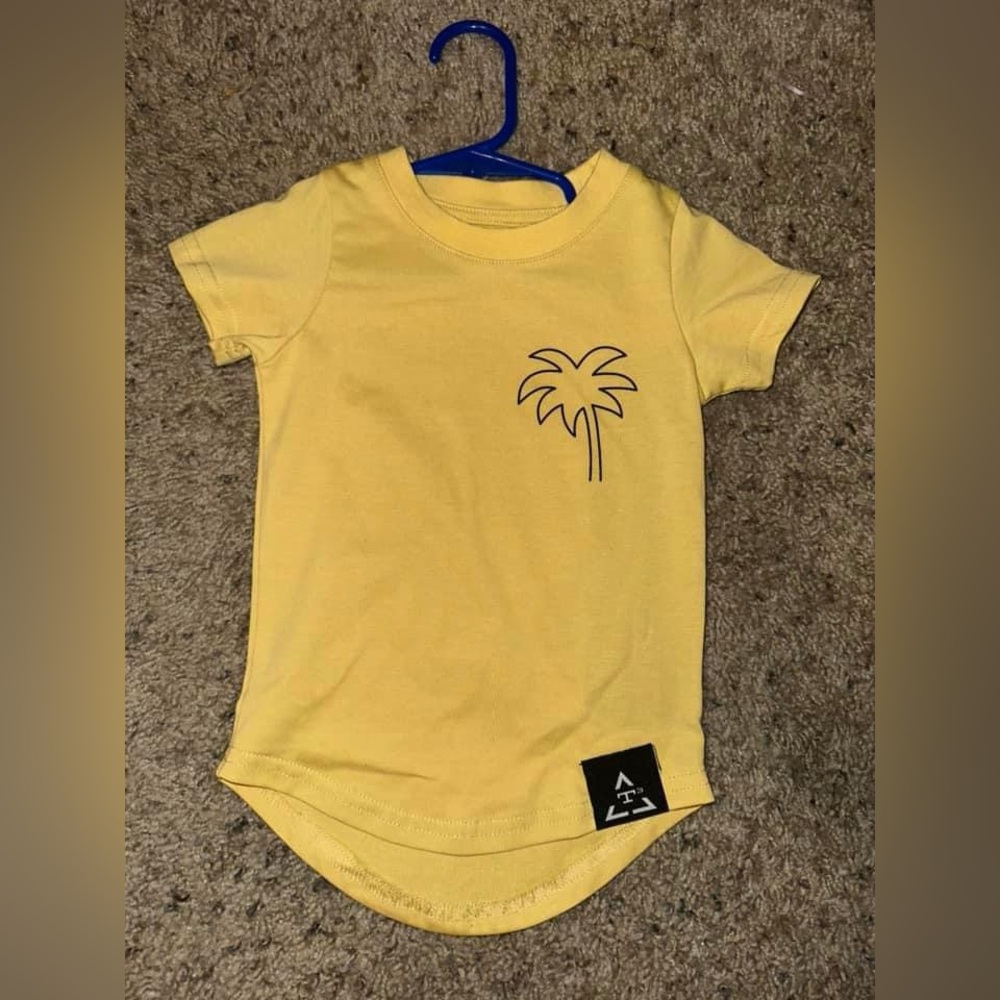 Trilogy design co yellow tshirt
